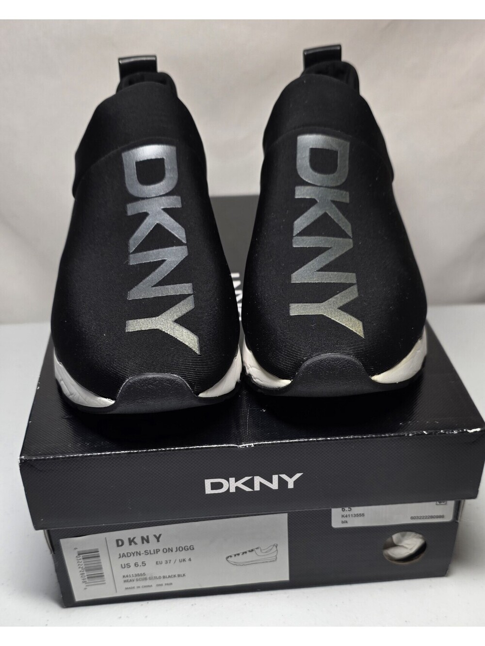 DKNY Women's Size 6.5 Jadyn Slip On Jogg Sneakers Black w/Silver "DKNY" Letterin
